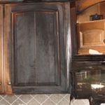 A fire damaged living space before restoration services